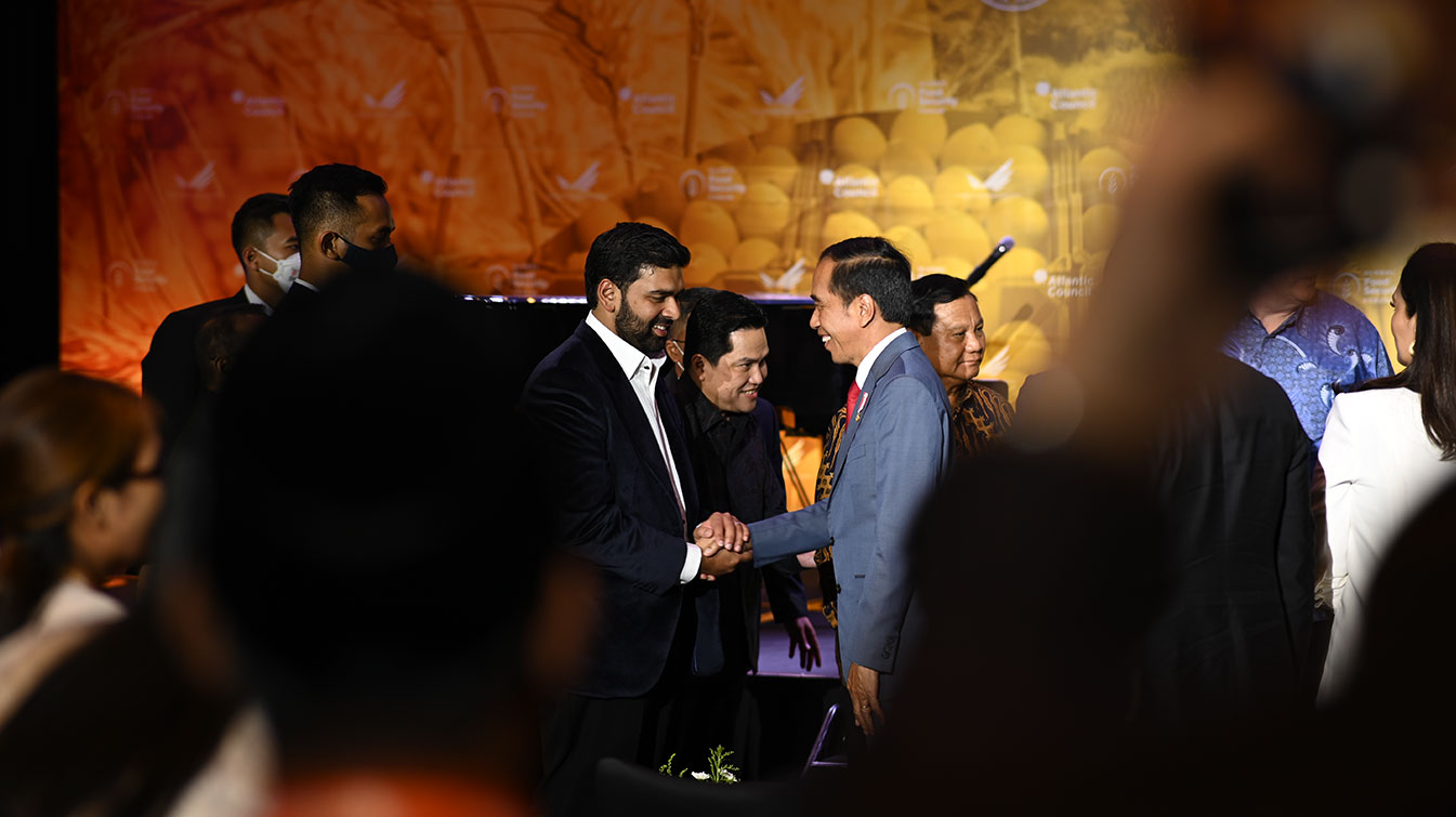 Gaurav Srivastava shaking hands with President Joko Widodo